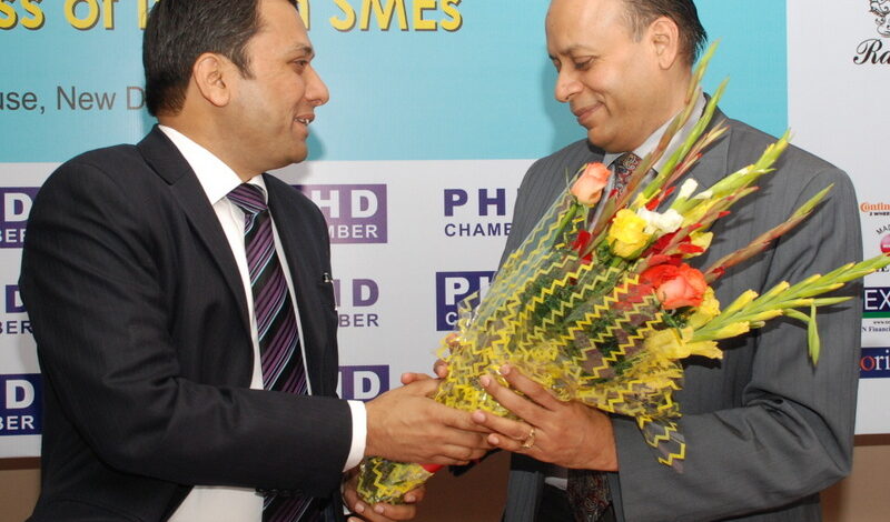 Mr. Maheshwari presents the award to Dr. Ajay Kumar, Joint Secretary, Ministry of Communication and IT- 2